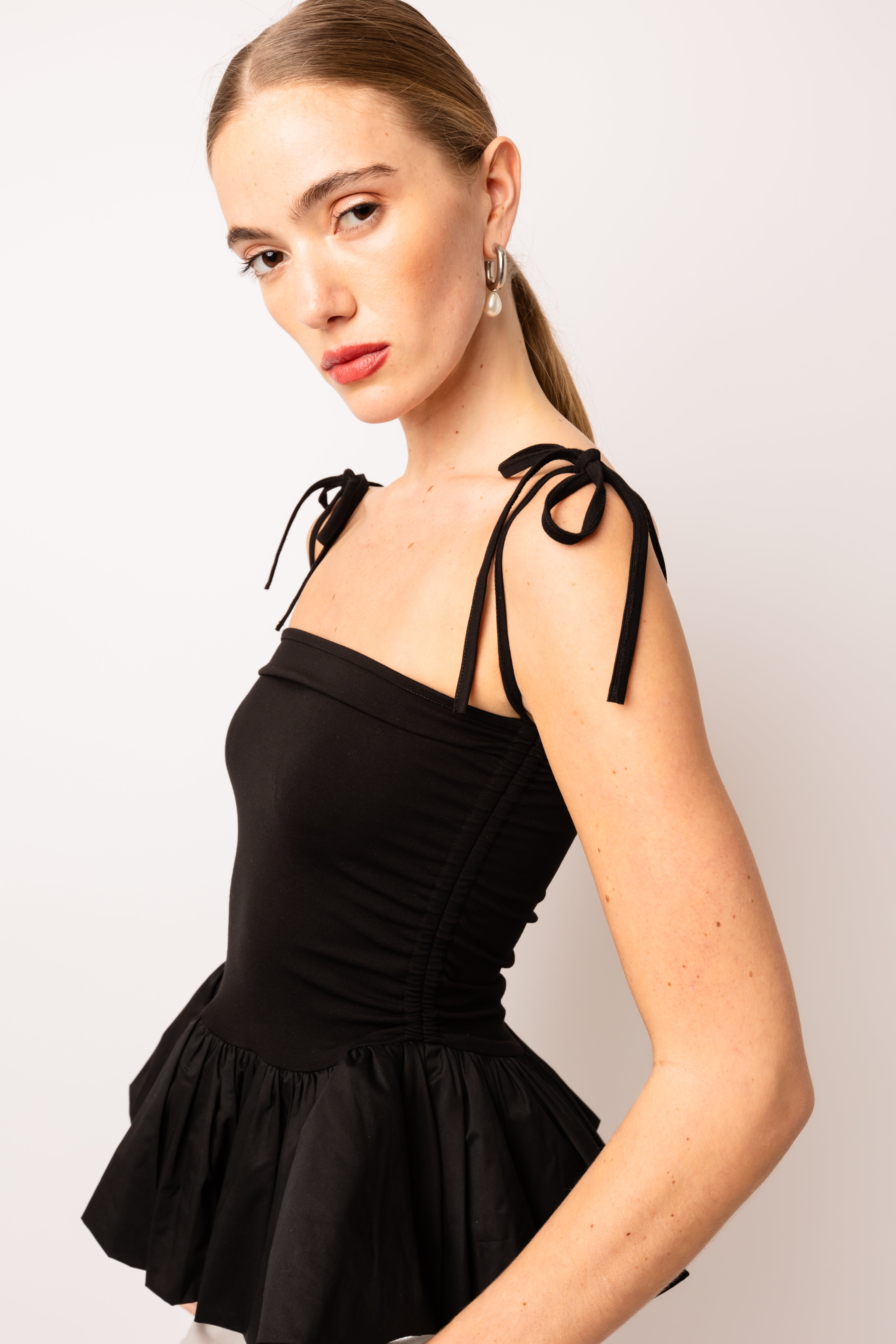 Alexa Black Puffball Ruffle Top